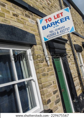 Macclesfield,UK - October 5  2014: Residential to let rental estate agents board on a stone terraced cottage in a north west UK town