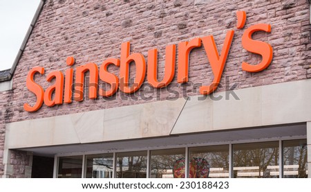 MACCLESFIELD,UK - NOVEMBER 12 2014: Sainsburys supermarket  sign with logo.  Retail food prices are falling with all supermarkets including Sainsburys cutting their prices.