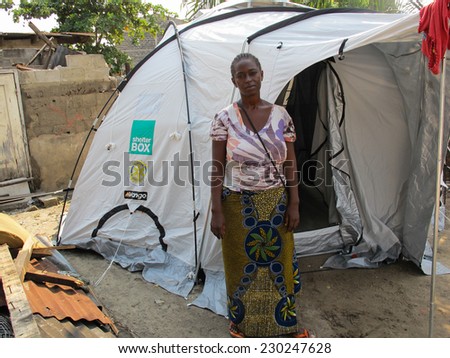Brazzaville, Congo - March 28 2012:  Marina Issu next to her disaster relief tent erected after an arms dump explosion made her homeless.