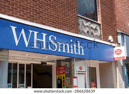 Cheshire, UK - June 4th 2015: WH Smith shops have Post Office counters within them as part of the restructuring by the Post Office.  WH Smiths shop front, logo and sign