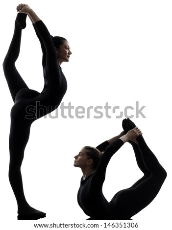two women contorsionist practicing gymnastic yoga in silhouette   on white background