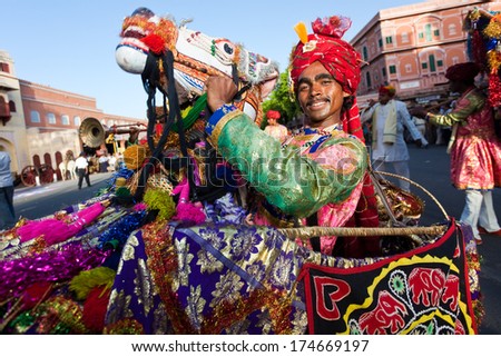 RAJASTHAN, INDIA - MARCH 30, 2009: people celebrating the god who protect them in the Gangaur festival one of the most important of the year