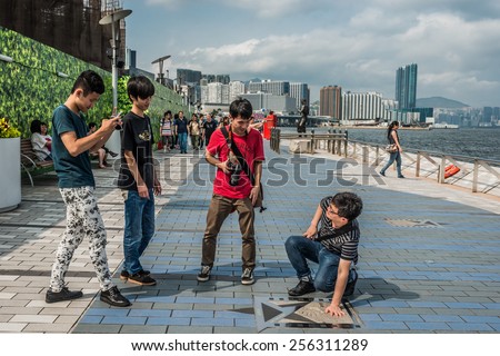 Kowloon, Hong Kong ,China - June 9, 2014: people tourist Avenue of Stars Tsim Sha Tsui