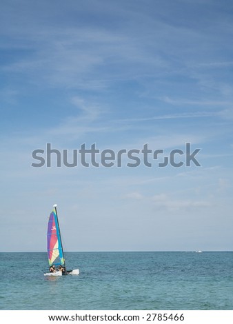 sailing boat on the sea whith a blue sky and calm sea