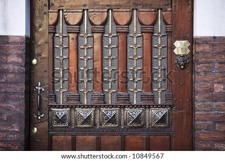 ancient door of the exterior house building in the beautiful city of venice in italy