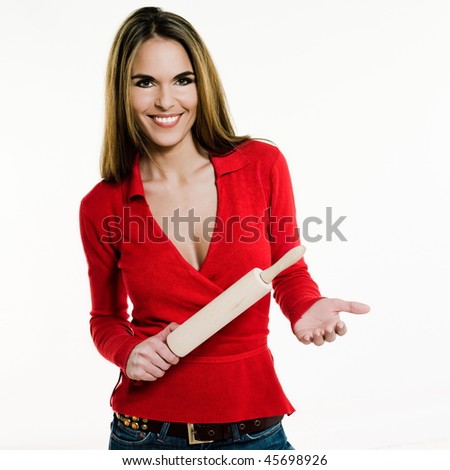 beautiful brunette caucasian woman on white background holding a rolling pin