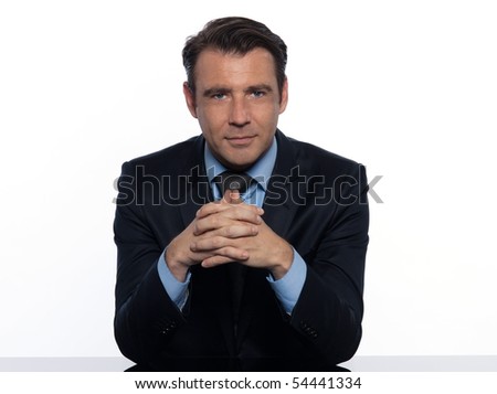 Handsome caucasian man businessman sitting pensive portrait on white isolated background