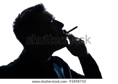 One Caucasian Man Portrait Smoking Cigarette Silhouette In Studio ...