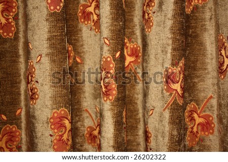 A background of the design of an ethnic curtain design, with folds.