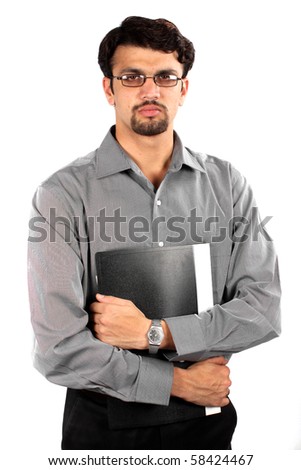 An unemployed Indian youth standing with a file waiting for a job interview, on white studio background.