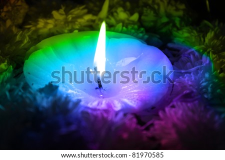 A holy Diwali candle in colorful light/energies. Also used in alternative therapies like color,aroma and spiritual healing purposes.