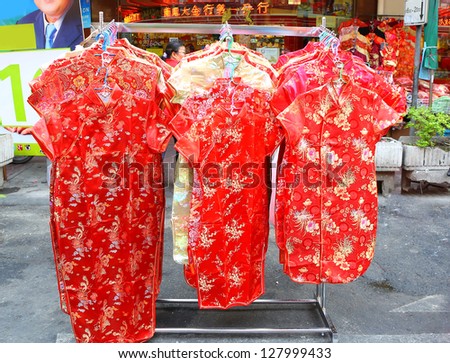 BANGKOK, THAILAND - FEBRUARY 10: Chinese Clothes Decorations at Yaowarat Road in Bangkok Chinatown district during the Chinese New Year celebrations on February 10, 2013 in Bangkok, Thailand