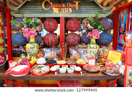 BANGKOK, THAILNAD - FEBRUARY 10: Offerings foods to the Gods at Yaowarat in Bangkok Chinatown during Chinese New Year celebrations on February 10, 2013 in Bangkok, Thailand