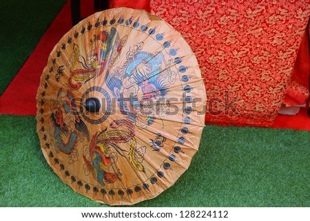 BANGKOK, THAILAND - FEBRUARY 10: Ancient chinese Umbrella Decorations show at Yaowarat Road in Chinatown during the Chinese New Year celebrations on February 10, 2013 in Bangkok, Thailand