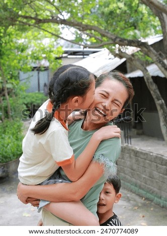 Similar – Image, Stock Photo Cheerful mom and son playing together in field