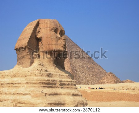 Ancient Egyptian Sphinx Of Giza With Great Pyramid Of Cheops On The ...