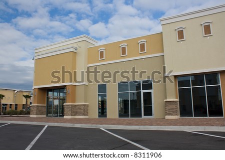 newly constructed commercial mall with stone accents