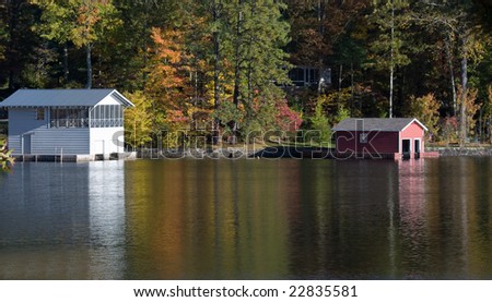 Mountain lakefront house during autumn leaf change in North Carolina