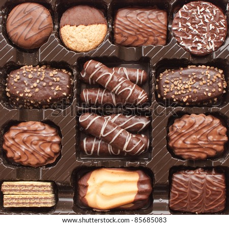 The big set of chocolate cookies (closeup, background)