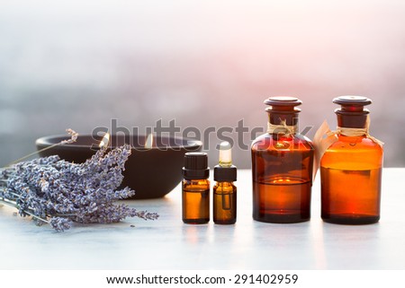 Spa oils in bottles with lavender