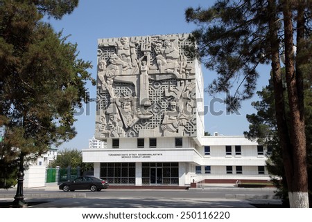 Ashgabad, Turkmenistan - October 10, 2014. City Archives building is decorated with bas-relief sculpture, made Soviet sculpture Ernst Neizvestny. It was his last work in USSR before emigrating.