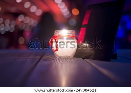 Romantic atmosphere with a candle on the table