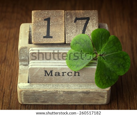 Old vintage calender showing the date 17th of march which is St.Patricks day with lucky shamrock