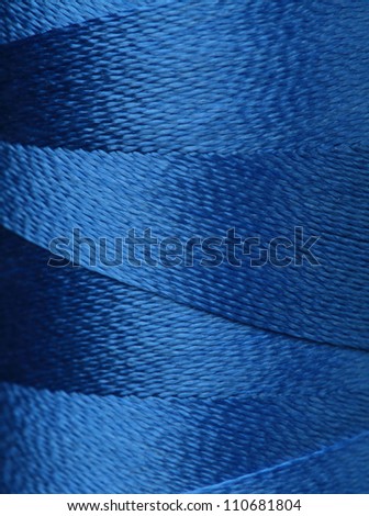texture of blue thread in spool