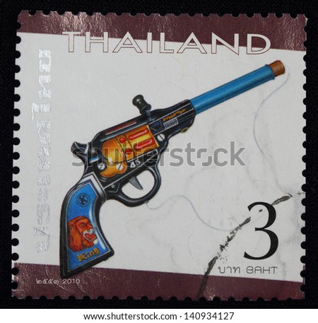 THAILAND - CIRCA 2010: A stamp printed in Thailand shows the image of air gun Pistol, from the series \