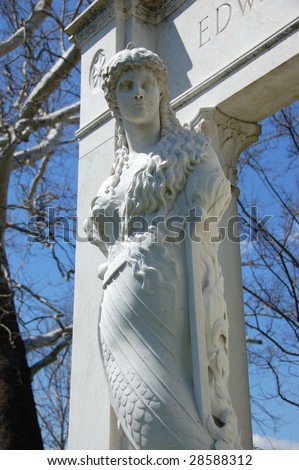 white marble statue Greek woman grave marker