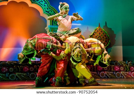 BHUBANESWAR, INDIA - NOVEMBER 24: An unidentified group of male dancers wears traditional ladies costumes and perform Gotipua dance at Rabindra Mandap on November 24, 2011 in Bhubaneswar, India