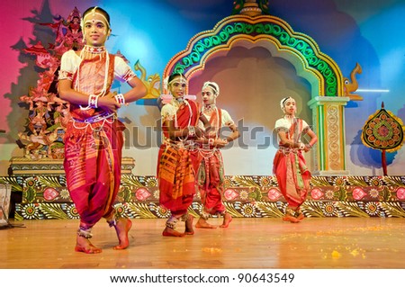 BHUBANESWAR, INDIA - NOVEMBER 24: An unidentified group of male dancers wear traditional ladies costume and perform Gotipua dance at Rabindra Mandap on November 24, 2011 in Bhubaneswar, India