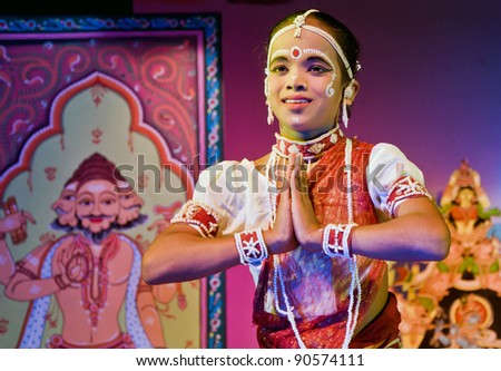 BHUBANESWAR, INDIA - NOVEMBER 24: An unidentified Male dancer wears traditional Ladies costume and performs Gotipua dance at Rabindra Mandap on November 24, 2011 in Bhubaneswar, India