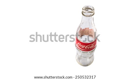 KUALA LUMPUR, MALAYSIA - FEBRUARY 7TH, 2015. Empty Coca Cola bottle. Coca Cola drinks are produced and manufactured by The Coca-Cola Company, an American multinational beverage corporation.