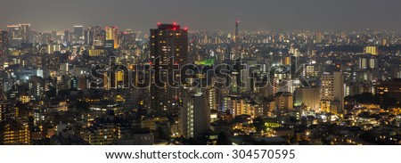 TOKYO, JAPAN - AUGUST 8TH, 2014: View of Tokyo metropolis at night . Tokyo is one of the 47 prefecture of Japan and is the capital of Japan. it is also Japan\'s largest city.