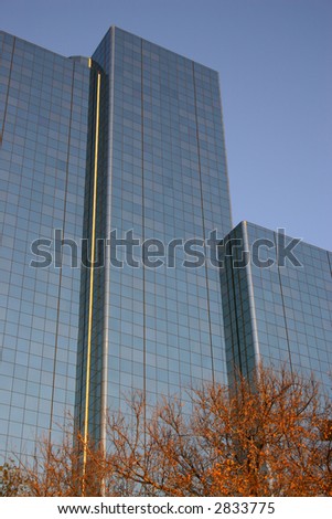 Dallas skyline and hotel building against blue sky