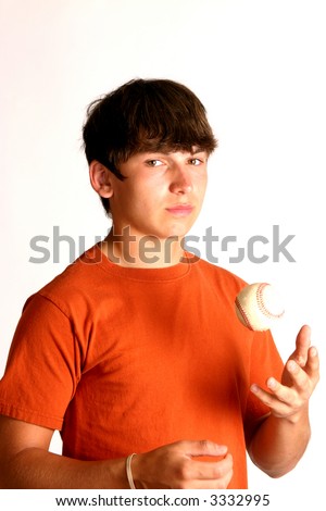 Teenage boy with baseball and wearing orange t-shirt