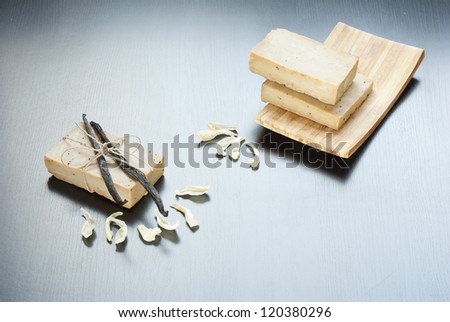 bar of soap with vanilla beans and vanilla petals