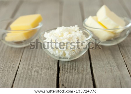 dairy products, rustic wooden table background