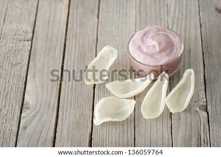 facial cream with petals