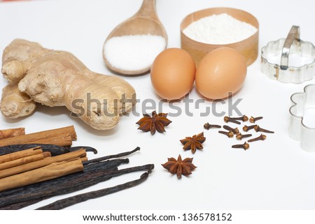 gingerbread cookie ingredients on white kitchen table
