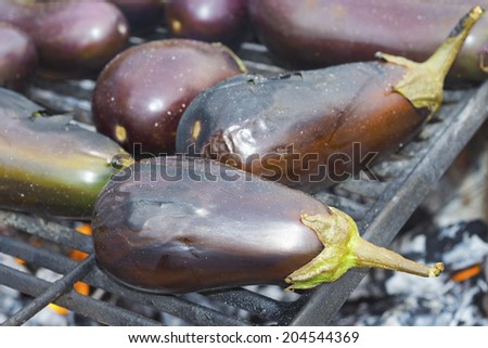 eggplants baking on the roast, natural outdoor food