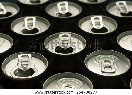 opened and closed canned drinks in black