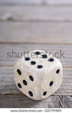 dice on old wood table