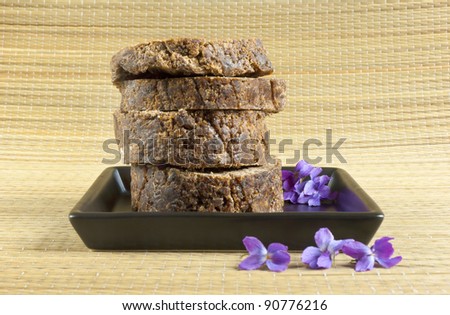 handmade african black soap with flowers