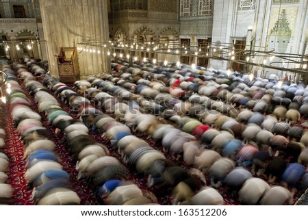 ISTANBUL, TURKEY - JULY 19: People praying at Ramadan night in Blue Mosque on July 19, 2012 in Istanbul, Turkey.
