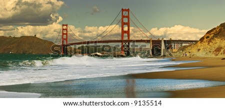 Panoramic view on Golden Gate bridge as seen from Baker Beach in San Francisco, California.