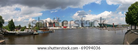 Panoramic view on Amstel river and Amsterdam, Netherlands (Holland).