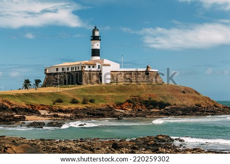 Barra Lighthouse (Farol da Barra) in Salvador, Brazil. It was built in 1698 and was the first lighthouse in the Americas. Its lamp was fueled by whale oil. The lighthouse was electrified in 1937.