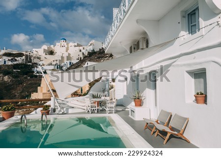 OIA, SANTORINI, GREECE - NOVEMBER 3: pool and inner terrace of Caldera Villas, one of the hotels located in Oia, Santorini, Greece on November 3, 2014.